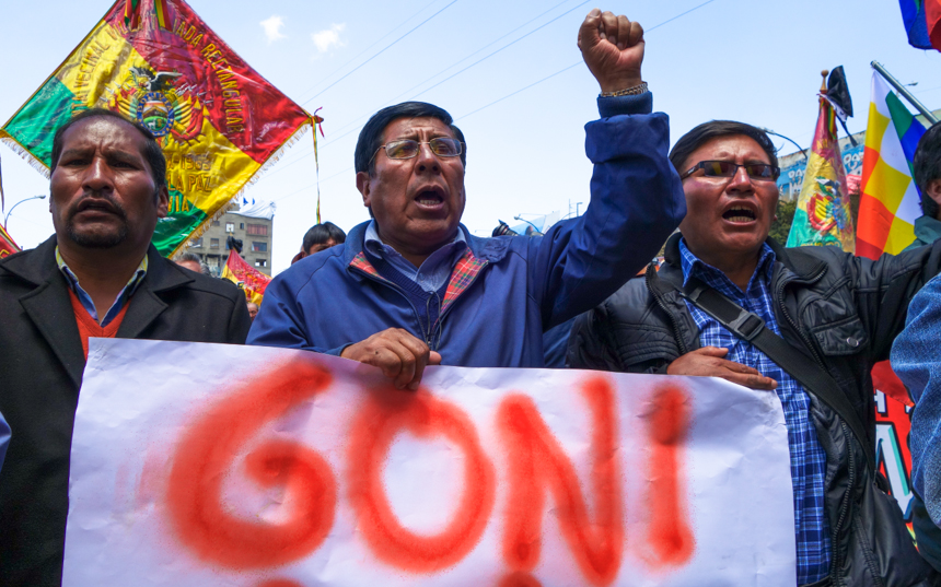 Survivors demand the extradition of Gonzalo during a Day of Dignity march in 2014.