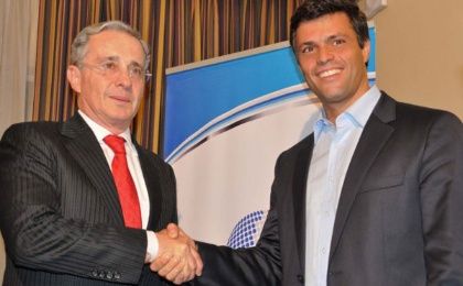 Leopoldo Lopez (R) with former Colombian President Alvaro Uribe (L). Uribe, whose administration was marred by human rights abuses, has been accused of having links with paramilitary death squads.