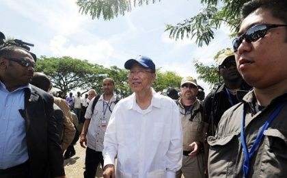 United Nations Secretary-General Ban Ki-moon, center, during a July 2014 visit to Haiti. 