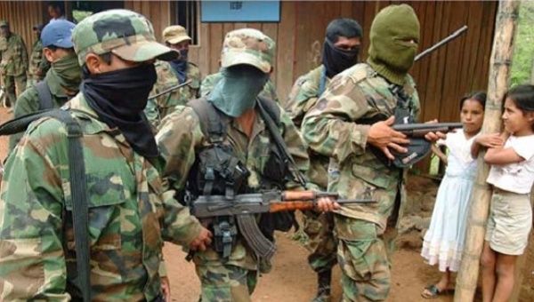 Paramilitaries kill, rape and torture Colombian campesinos.