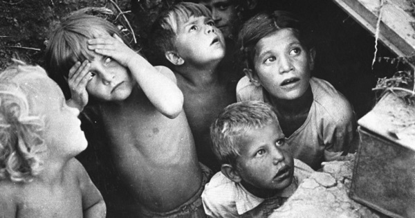 Children in Stalingrad hiding from bombing by German planes in a 1942 photo taken by L.I. Konov.