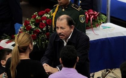 Nicaragua's President Daniel Ortega gives his condolences to relatives of the late President of the National Assembly of Nicaragua, Rene Nunez during memorial service at the National Assambly Building in Managua, Nicaragua September 11, 2016.