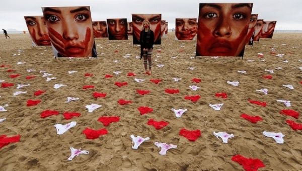 Women's underwear and photos from photographer Marcio Freitas were used to protest rape and violence against women, Rio de Janeiro, Brazil, June 6, 2016.