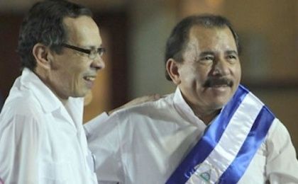 Rene Nuñez Tellez (L) next to Nicaraguan President Daniel Ortega