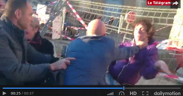 A video grab of the security guard tackling the teenager.
