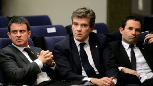 Manuel Valls, Arnaud Montebourg and Benoit Hamon during a press conference in Madrid on Nov. 27, 2013.