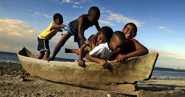 Children from Garifuna community in Roatan, Honduras, play on the beach, March 17, 2009.