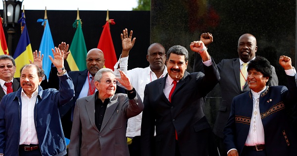 Raul Castro stands next to Latin American and Caribbean leaders during an ALBA alliance summit in Caracas, Venezuela.