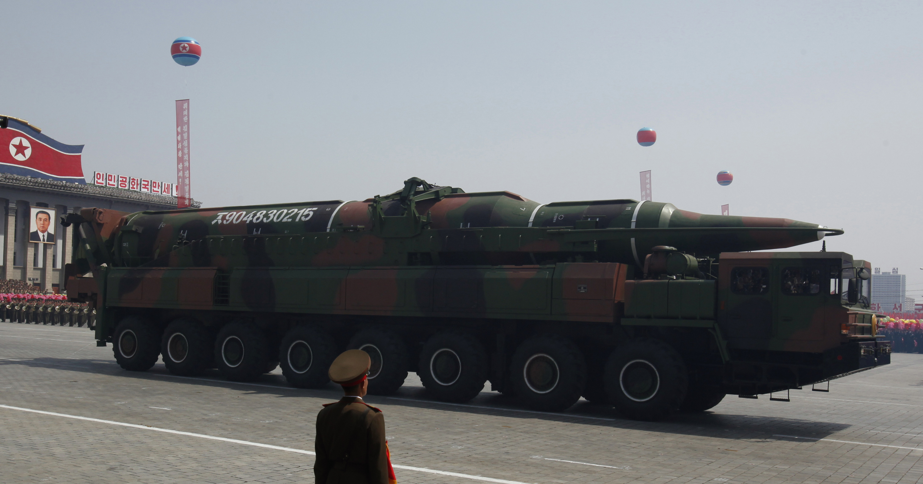A rocket is carried by a military vehicle during a military parade in Pyongyang.