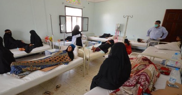 Women sit with relatives infected with cholera at a hospital in the Red Sea port city of Hodeidah, Yemen May 14, 2017.