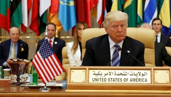U.S. President Donald Trump takes his seat before his speech to the Arab Islamic American Summit in Riyadh.