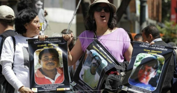 Colombians hold a demonstration in support of citizens displaced during the country's armed conflicts.