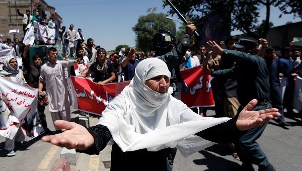 An Afghan woman chants slogans during a protest in Kabul, Afghanistan.