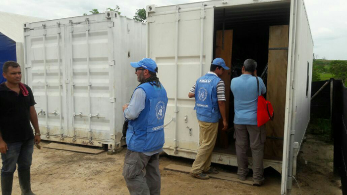 Members of the United Nations mission in Colombia overseeing the delivery of arms.
