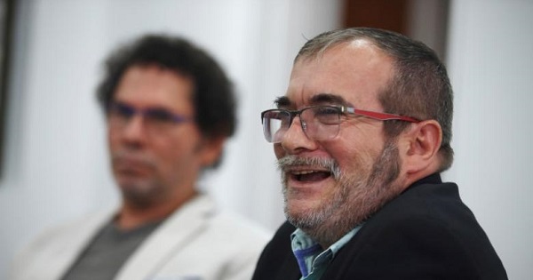 Colombia's FARC-EP leader Rodrigo Londono, known as Timochenko, attends a news conference.