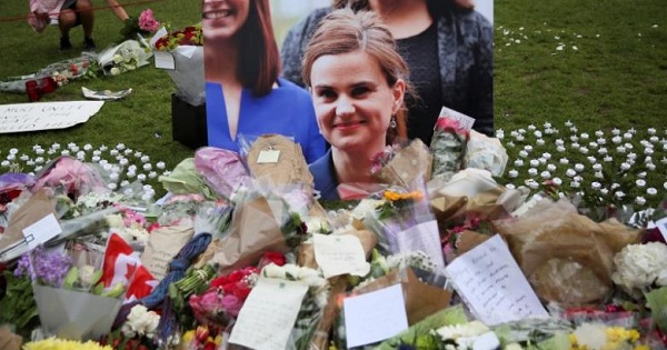 Tributes in memory of murdered Labour Party MP Jo Cox, who was shot dead in Birstall, are left at Parliament Square in London, Britain, on June 18, 2016.