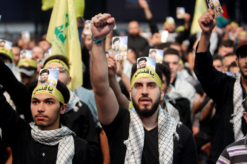  Supporters of Lebanon's Hezbollah leader Sayyed Hassan Nasrallah chant slogans and gesture during a rally marking Al-Quds day in Beirut's southern suburbs, Lebanon June 23, 2017. 