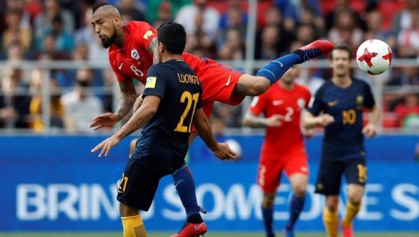 FIFA Confederations Cup Russia 2017 - Group B - Spartak Stadium, Moscow, Russia - June 25, 2017 Chile’s Arturo Vidal in action with Australia’s Massimo Luongo.