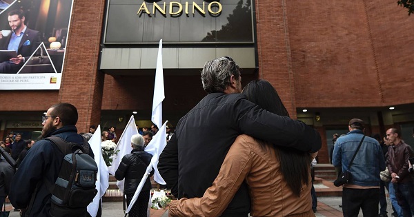 Relatives of the victims in a vigil outside the Andino mall in Bogota.
