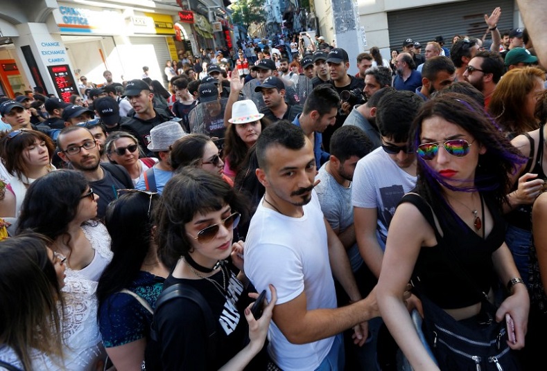 Riot police disperse LGBT rights activists as they try to gather for a Pride parade, which was banned by the governorship in central Istanbul, Turkey, June 25, 2017. 