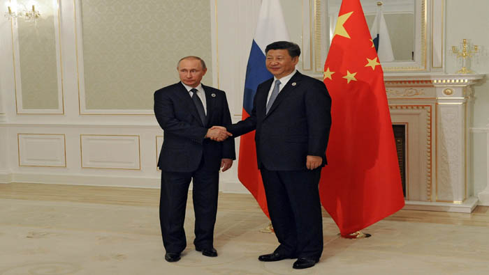 Hasta 22 veces se han reunido Putin (i) y Xi.