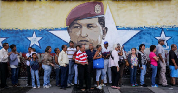 Voters line up to cast their ballot in Venezuela's dry run vote ahead of the National Constituent Assembly, July, 16, 2017.