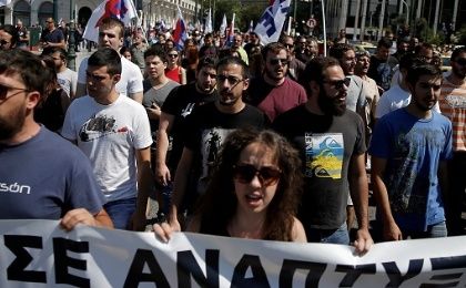 Protesters shout slogans during a 24-hour strike by employees of hotels and restaurants, in Athens, Greece, on July 20, 2017.