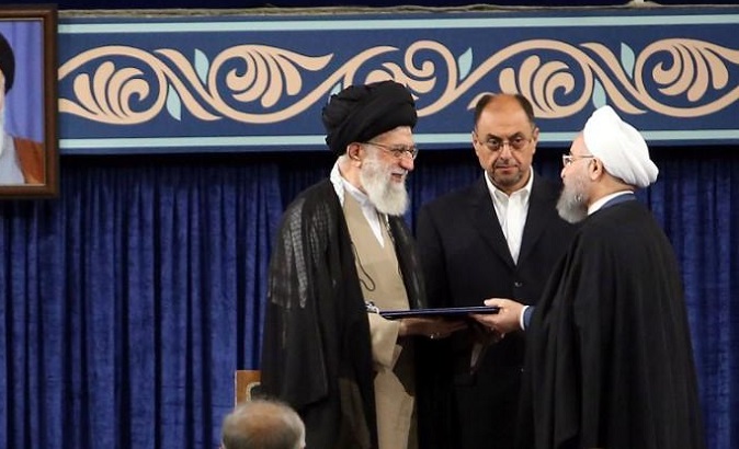 Iran's President Hassan Rouhani receives the presidential mandate from Iran's Supreme Leader Ayatollah Ali Khamenei.