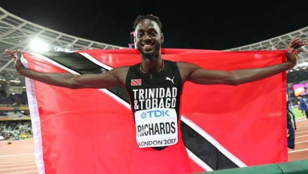 Jereem Richards celebrates after taking home a bronze medal in the men's 200 meters final at the World Championships in Athletics.