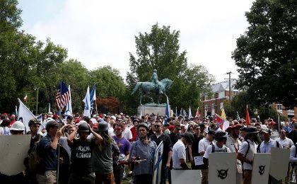 White nationalists gather under a statue of Robert E. Lee during a rally in Charlottesville, Virginia. 
