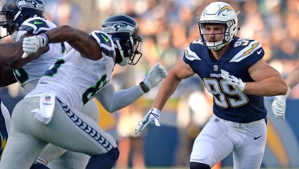 Los Angeles Chargers defensive end Joey Bosa (99) rushes against the Seattle Seahawks in Carson, California, U.S., on August 13, 2017. 