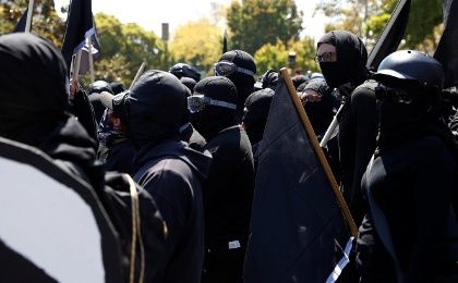 Masked counter-demonstrators gather against the cancelled No Marxism in America rally in Berkeley, California, U.S., on August 27, 2017.