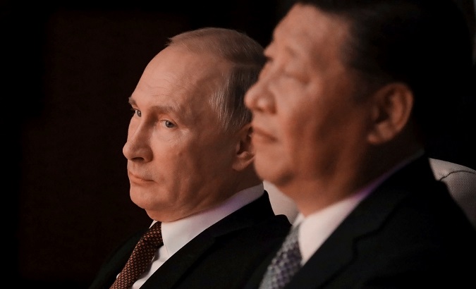 Russian President Vladimir Putin and Chinese President Xi Jinping watch a concert in Xiamen, China September 3, 2017.