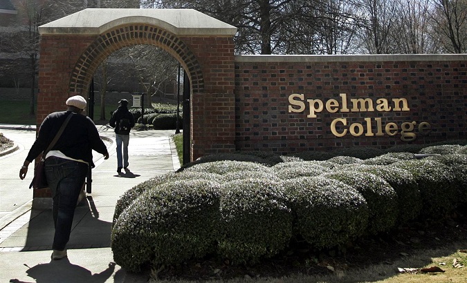 Students walk through the entrance to Spelman College in Atlanta, Georgia.