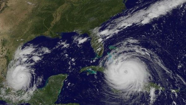 Hurricane Irma and Hurricane Katia (L) are seen in this NASA GOES satellite image.