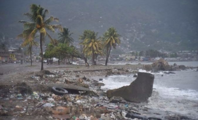 Debris washes up on a beach in Cap-Haitien, Haiti as Hurricane Irma approaches.
