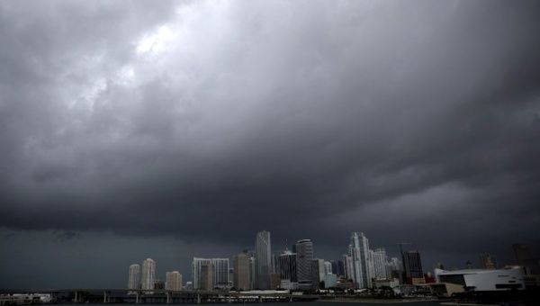 Dark clouds are seen over Miami's skyline.