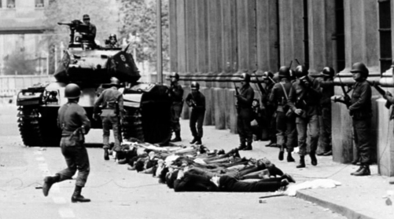 Troops under Pinochet, who had been appointed commander in chief, round up people on the streets of Santiago, Sept. 11, 1973.