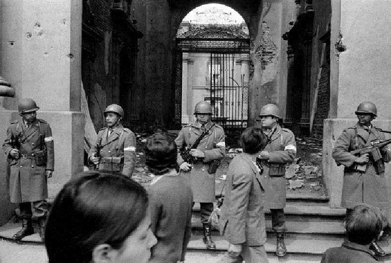 Chilean soldiers guard the presidential palace the day after the coup against Allende, Sept. 12, 1973.
