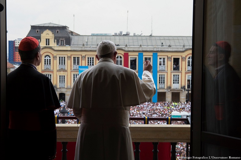 Pope Francis addresses the crowd before giving a blessing from the balcony of the Cardinal's Palace in Bolivar Square in Bogota, Colombia, Sept. 7, 2017.
