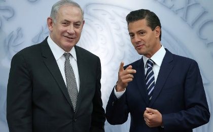 Netanyahu speaks with Pena Nieto during an address to the media at Los Pinos presidential residence in Mexico City, Mexico.