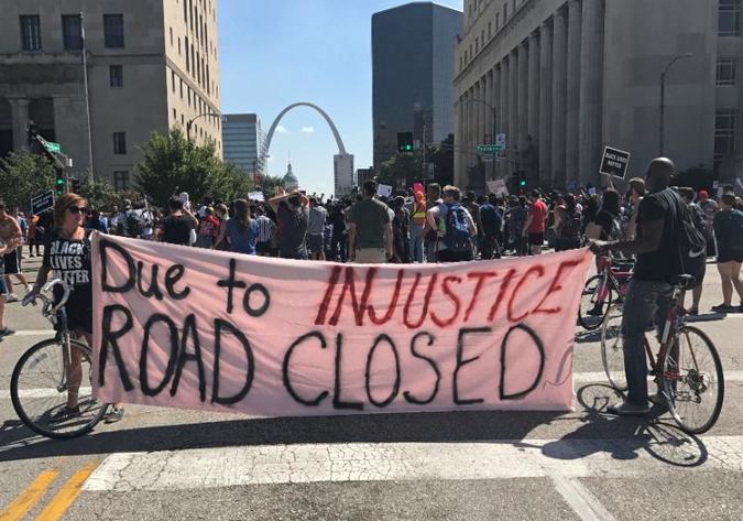 Protesters also demanded that police resign, while also calling for an economic boycott of St. Louis.
