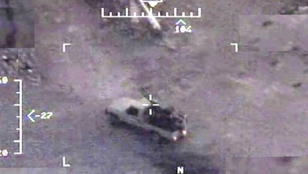 A truck is seen in the crosshairs of a Predator drone.