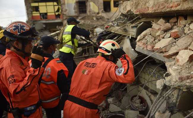 Rescue workers look for survivors still trapped under the rubble in Mexico.