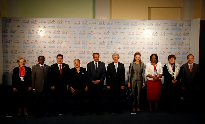 World leaders pose for a picture while attending a WHO Global Conference on non-communicable diseases in Montevideo, Uruguay.