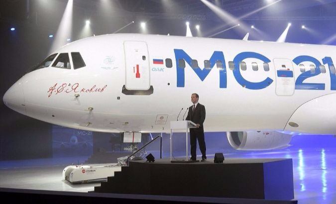 Prime Minister Dmitry Medvedev at the unveiling of the MC-21-300 aircraft.