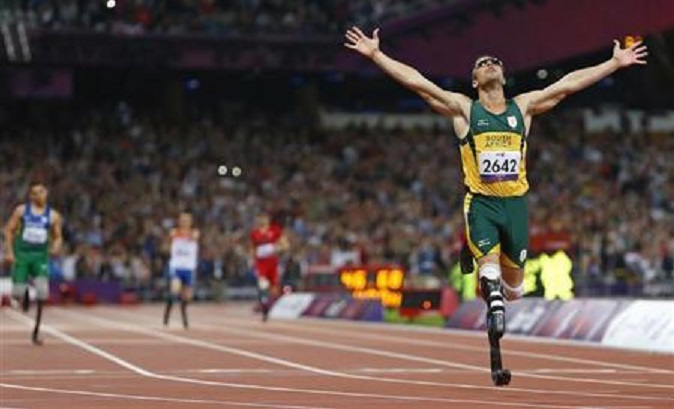 Oscar Pistorius of South Africa celebrates winning the Men's 400m T44 Final during the London 2012 Paralympic Games.