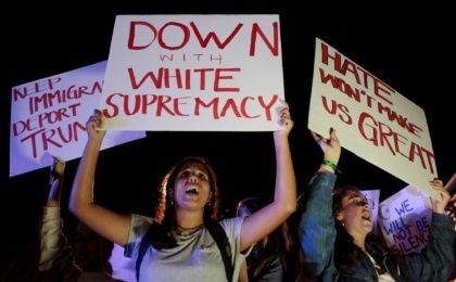 Florida too continued to witness protests on the fourth day as protesters refused to back down, carrying placards reading 'Down with White Supremacy' and 'Deport Trump'