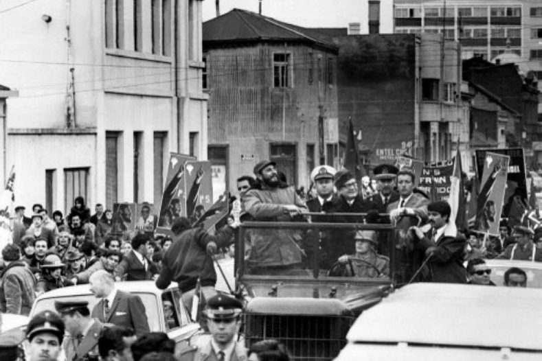 Fidel Castro parading through the streets of Chile with President Salvador Allende in 1971.