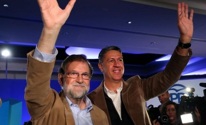 Spain's Prime Minister Mariano Rajoy campaigning with the leader of his PP party in Catalonia.